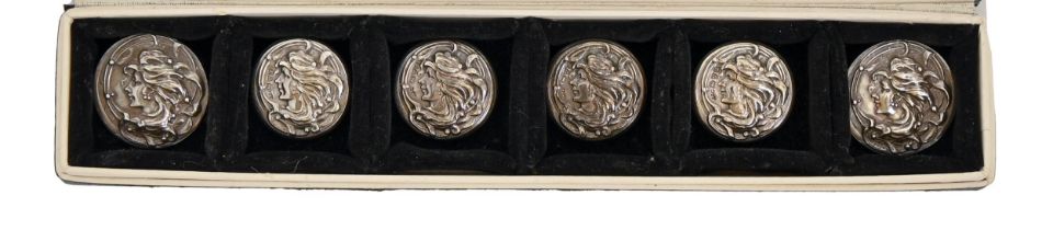 A set of four Edwardian Art Nouveau stamped silver buttons, 23mm diam, By Able & Charnell, Chester