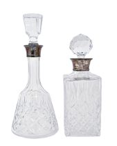 Two silver mounted cut glass decanters, with stoppers, Sheffield 1978, maker's marks rubbed