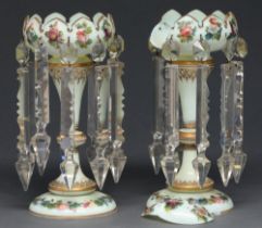 A pair of opaline glass lustres, c. 1870, picked-out with polychrome flowers, cut-glass tapering