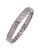 An 18ct white gold textured wedding band, London 1968, 2.7g, size K Light wear consistent with age