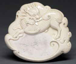 A blanc de chine qilin ink stone, 14cm, impressed seal Good condition