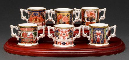 A set of six Royal Crown Derby miniature Imari pattern loving cups, recent manufacture, 35mm h,