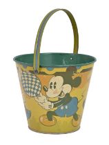Walt Disney. A children's seaside bucket decorated with Mickey and Minnie Mouse, bearing the