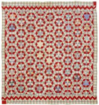 Folk Art. A patchwork quilt, late 19th/early 20th c, worked with six-pointed stars within