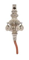A George V silver baby's rattle, with coral handle, 13.5cm l, by C H Cheshire, Chester 1921, 1oz
