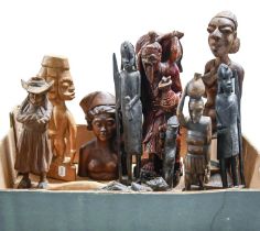 A quantity of African, Chinese, South East Asian and other wooden carvings, early 20th c and later