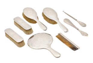 A George V silver brush set, engine turned in ribbon borders, by W G Sothers & Co, Birmingham