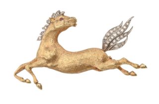 A diamond leaping horse brooch, in 18ct gold, with ruby eye, 53mm l, London 1970, 12.2g Good