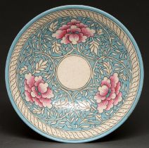 Charlotte Rhead. An H J Wood Bursley Ware bowl, c1930, tube lined with pink flowers on a blue
