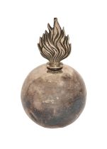 A George V silver flaming grenade table lighter, 13cm h, maker's mark rubbed, London 1921 Dented