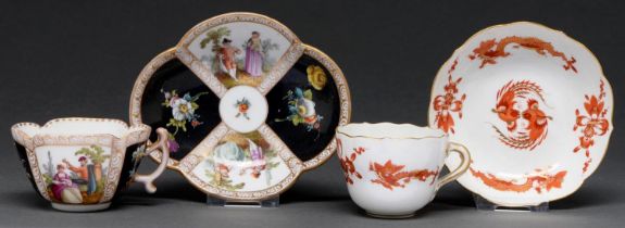 A Meissen Red Dragon pattern coffee cup and saucer and another German cup and saucer, 20th and