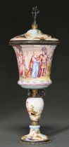 A Viennese silver gilt and painted enamel cup and cover, c1900, painted with mythological scenes,