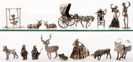 Fifteen silver and metalware toys, late 20th c, including Spanish and other figures and animals,