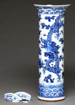 A Chinese blue and white sleeve vase, Qing dynasty, Kangxi period, painted with dragons and bats,