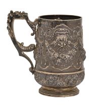 A Victorian silver mug, chased in high relief with cherub's heads, festoons and ribbons, 13cm h,