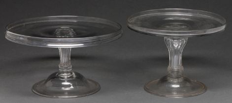 Two English glass salvers, mid 18th c, with moulded pedestal stem on domed and folded foot, 17 and