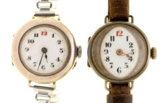 Two silver wristlet watches, 26 and 28mm diam, one import marked London 1915, the other contemporary