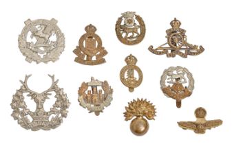Ten British Military cap badges, including Liverpool Scottish and Royal Air Force