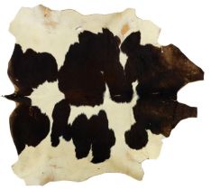 A vintage cow hide rug, 210 x 170cm