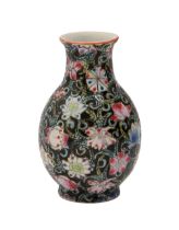 A Chinese miniature famille rose black ground vase, 65mm h, Qianlong mark Good condition
