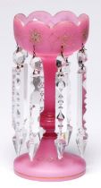 A Victorian etched pink glass lustre, with cut glass pendants, 28.5cm h Gilding rubbed