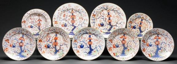 Eight Derby Kakiemon style plates and a muffin dish, early 19th c, various sizes, red painted mark