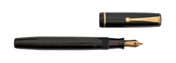 A Parker black Duofold pen, marked FOUNTAIN PEN PATENTED GEO S PARKER MADE IN CANADA, gold nib