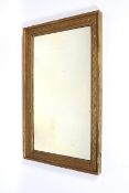 A 19th century large decorative gilt plaster and wood overmantel wall mirror.