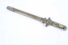 An unusual Oriental style brass knife.
