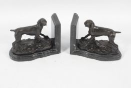 After E DROUOT, a pair of marble and bronze bookends.