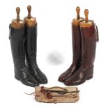 Two pairs of men's leather riding boots with trees, one pair in dust bags.