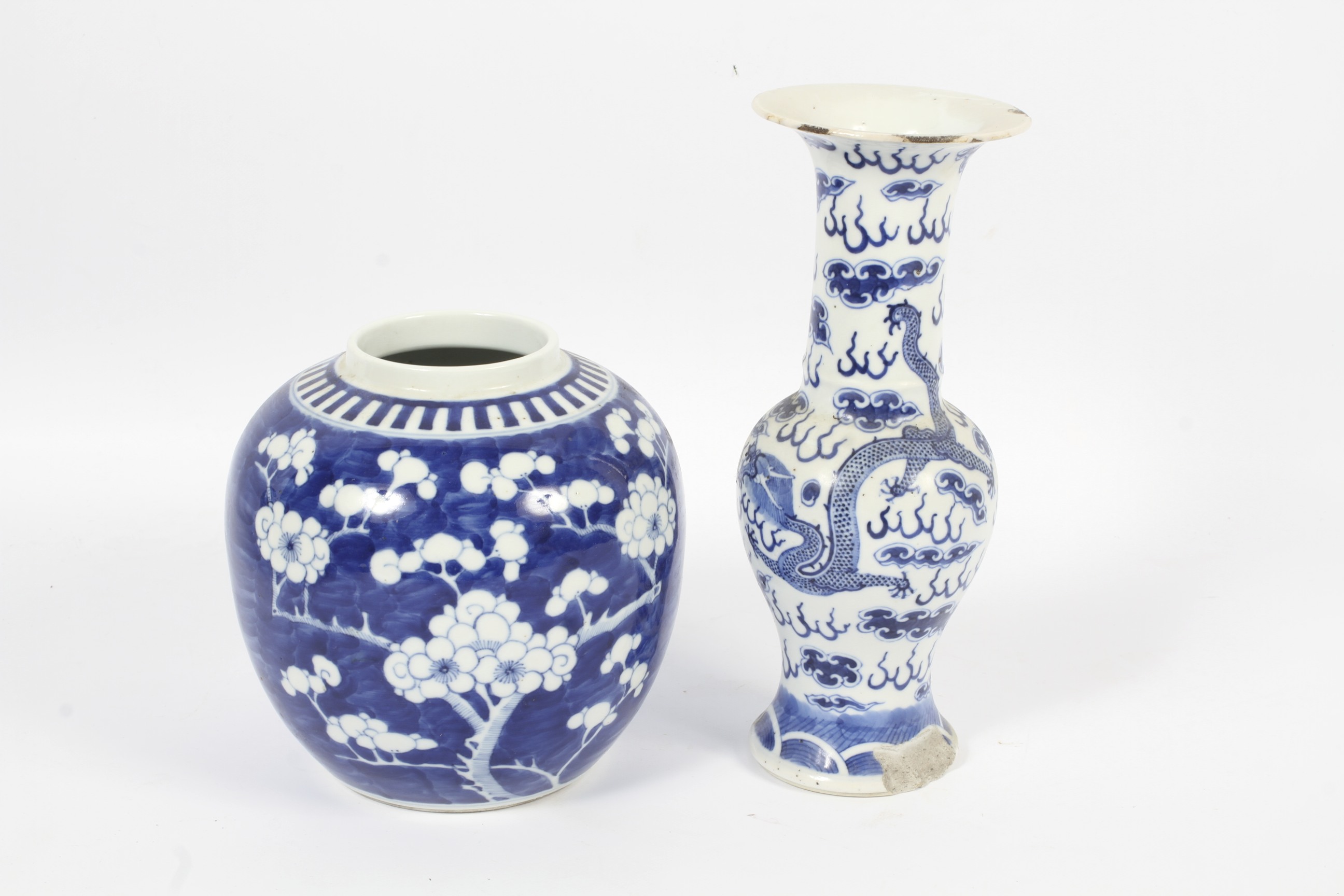 A Chinese porcelain blue and white dragon vase and a ginger jar.