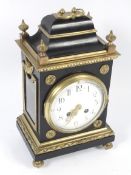 An early 20th century ebonised and gilt ormolu decorated bracket clock.
