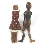 Two 19th century and later carved wooden 'Jigglers' dancing figures.