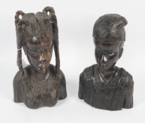 Two finely carved coromandel Nigerian busts of a man and woman. H31cm.