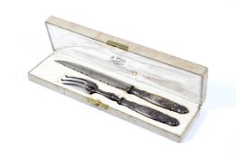 A French Art Nouveau silver handled cased carving set.