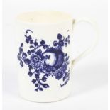 A 19th century Caughley-style blue and white printed cylindrical mug. With loop handle.