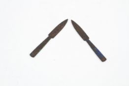 Two 20th century throwing knives.