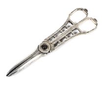 A pair of silver grape scissors with pierced decoration.