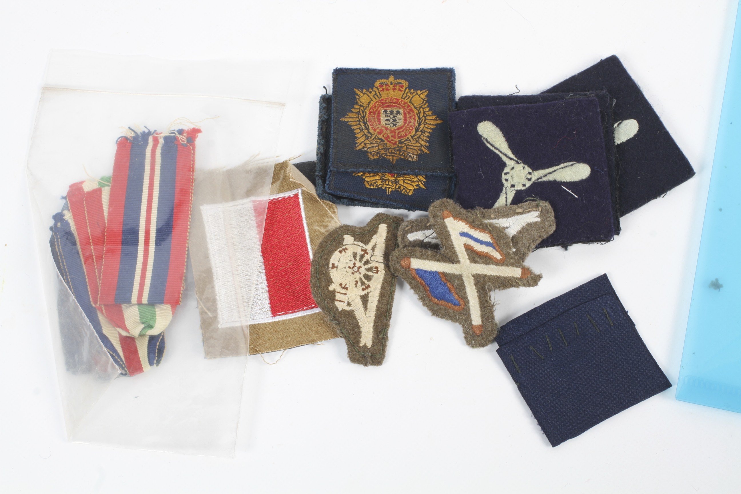 An extensive collection of fabric patches. - Image 8 of 9