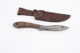D H Russel Grohmann belt knife with original leather sheath.