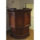 A Victorian Gothic style carved and stained pulpit.