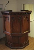 A Victorian Gothic style carved and stained pulpit.