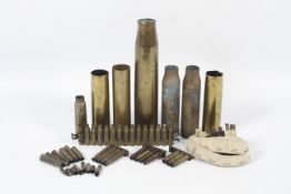 An assortment of military brass shell cases.