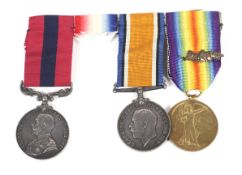 A WWI three piece medal group, comprising distinguished conduct in the field,