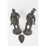 A pair of bronzed spelter figures of a knight and a king. Probably French, 20th century.