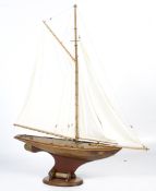 A well made oak pond yacht and stand.