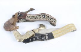 A Middle Eastern Jambiya dagger and another.