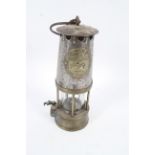 A vintage Eccles (Manchester) The Protector brass miner's lamp Type SL.