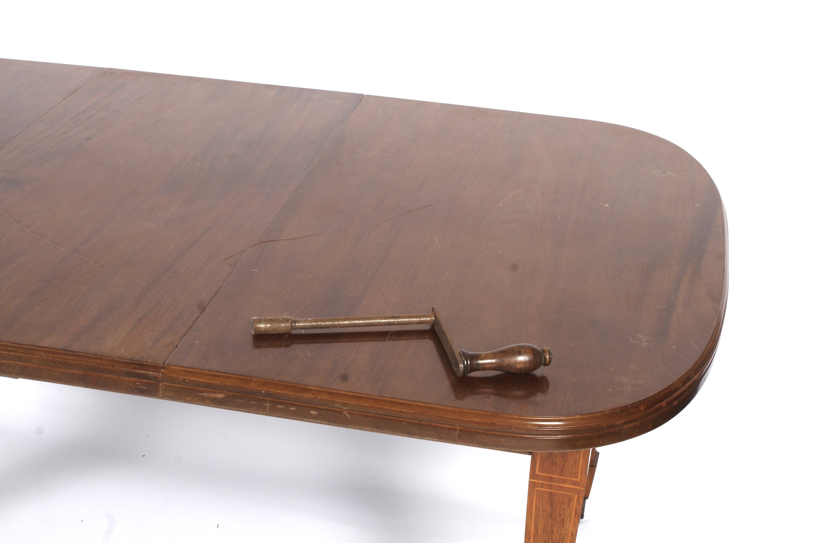 An Edwardian inlaid mahogany wind out dining table. - Image 3 of 3